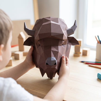 Paper Bison model in a child's hands