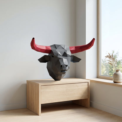 Paper Bull model on a table by the window