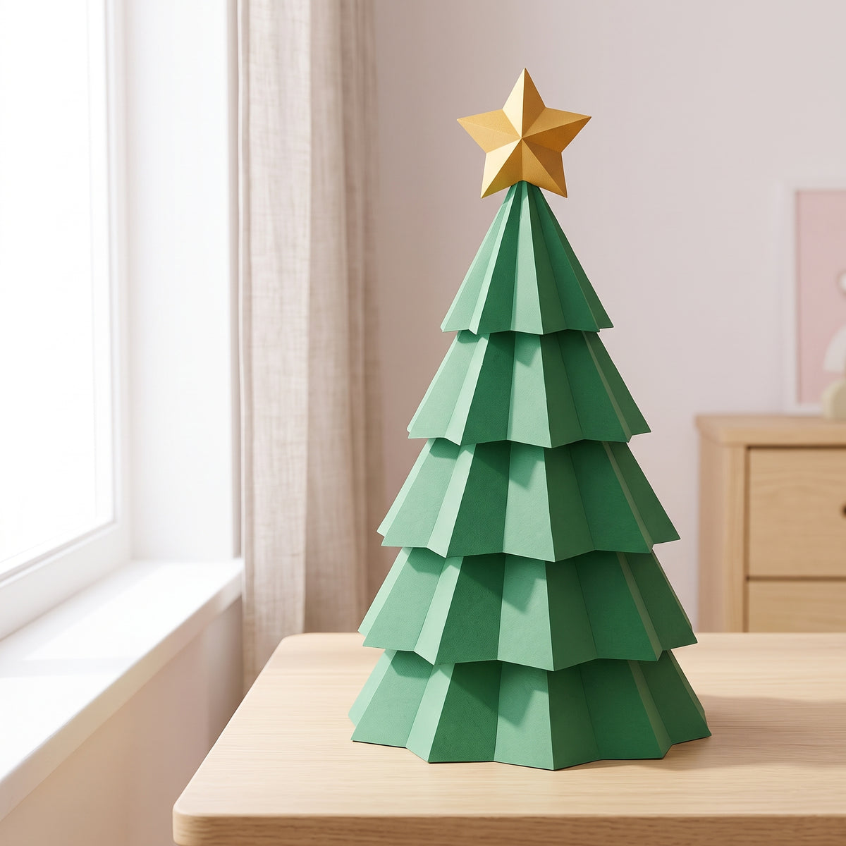 Paper Christmas Tree model on a table by the window