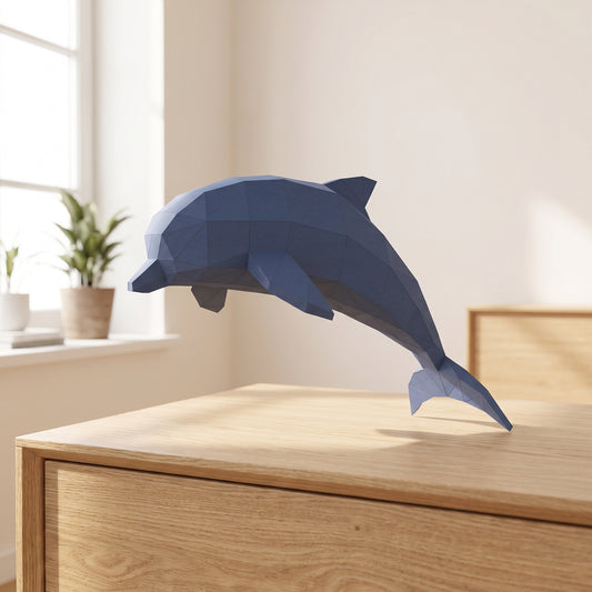 Paper Dolphin model on a table by the window