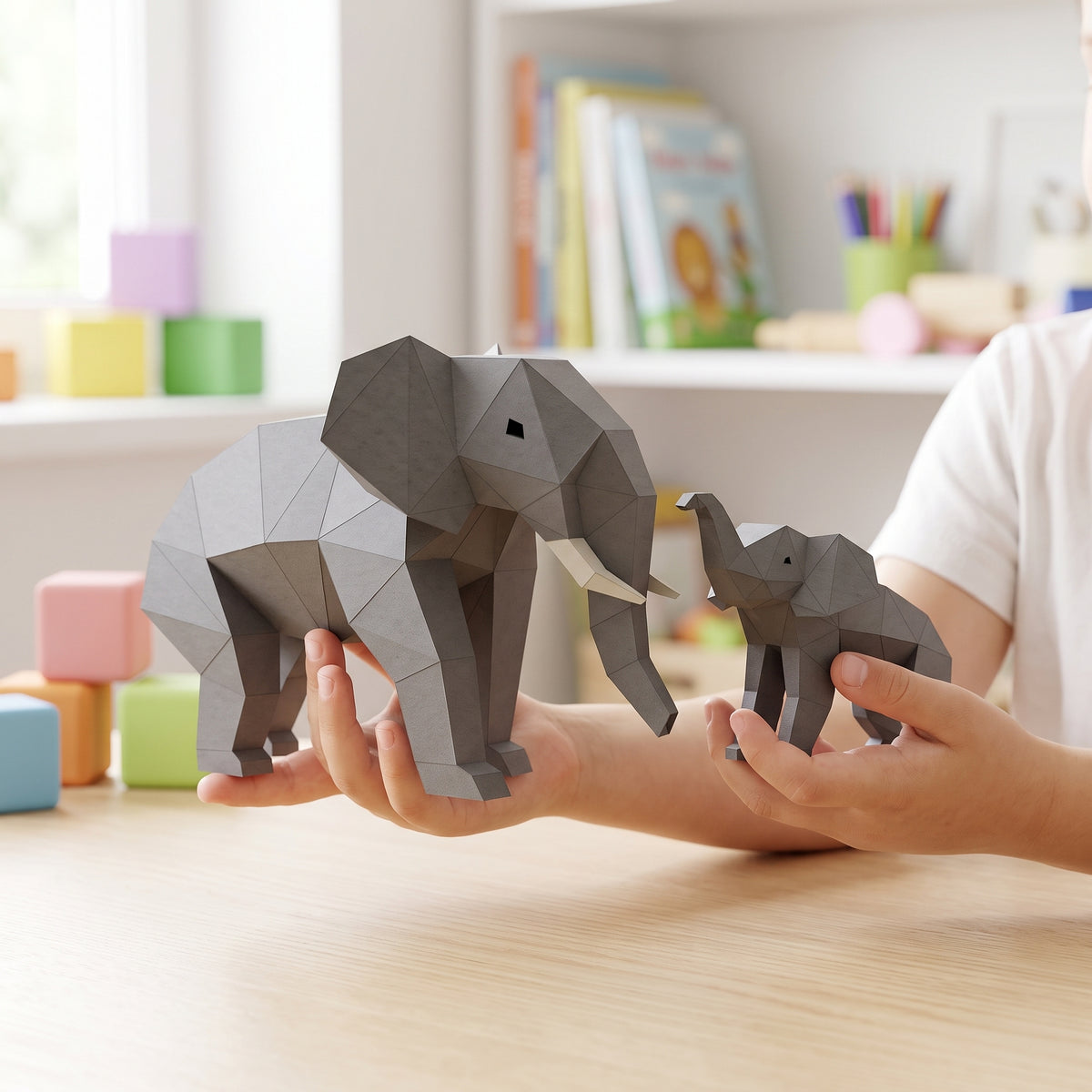 Paper Elephants model in a child's hands