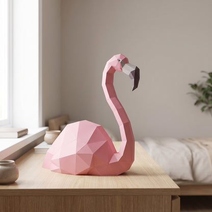 Paper Flamingo model on a table by the window