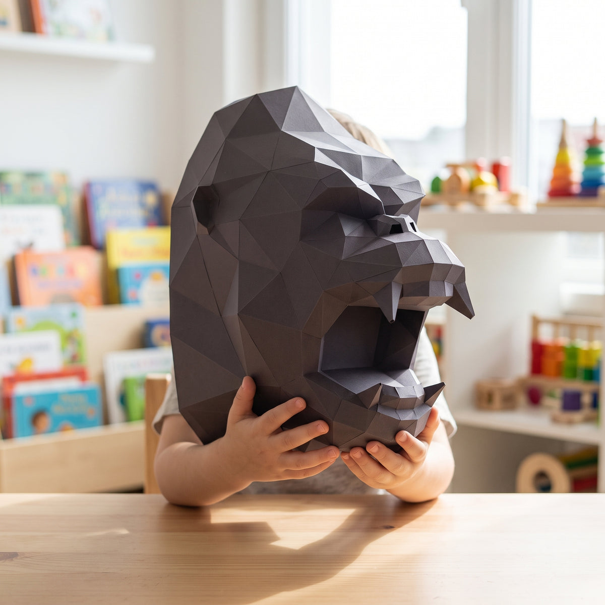 Paper Gorilla model in a child's hands