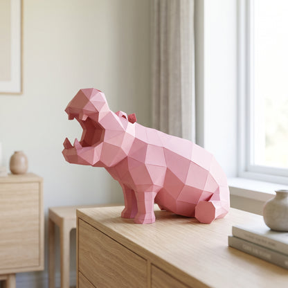 Paper Hippo model on a table by the window