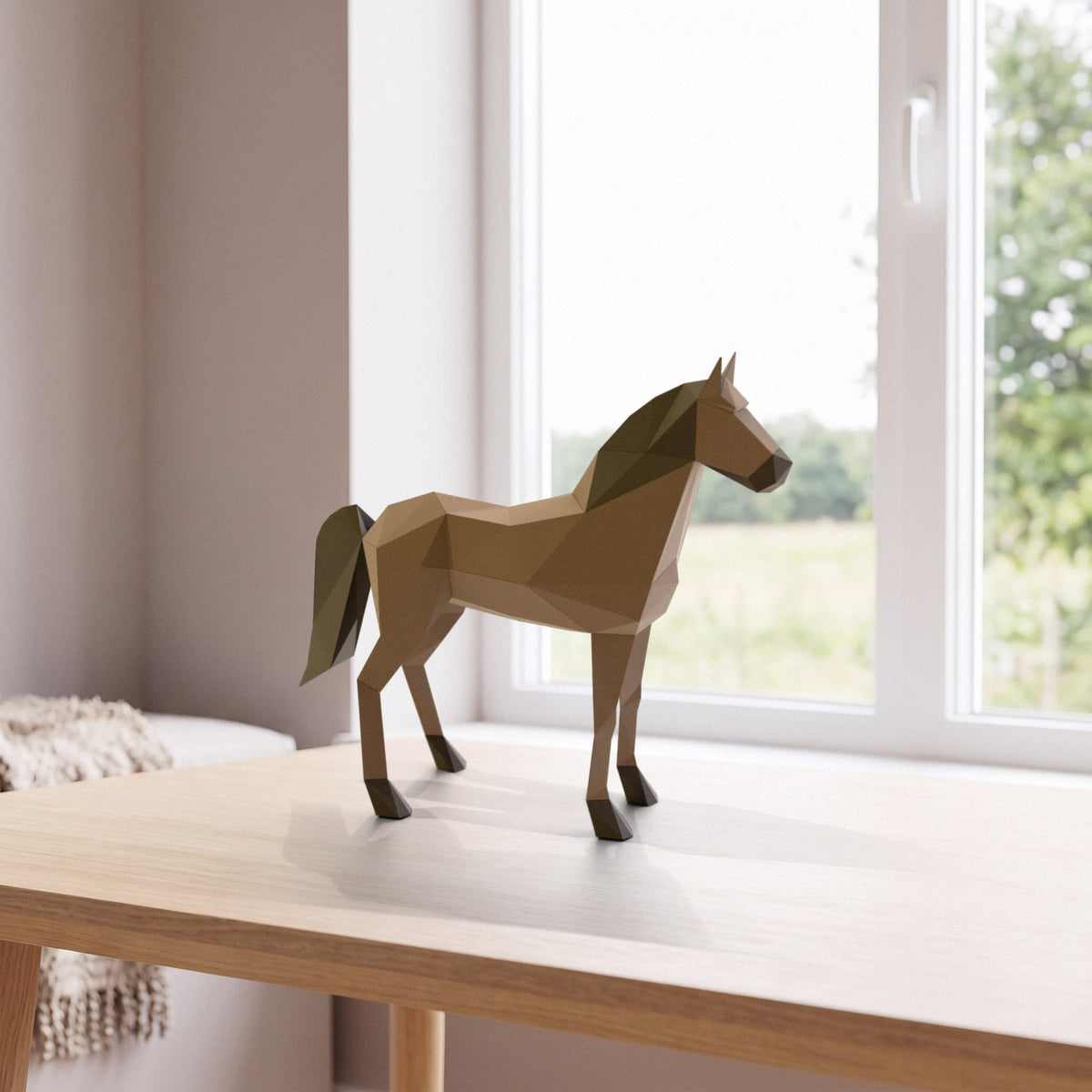 Paper Horse model on a table by the window
