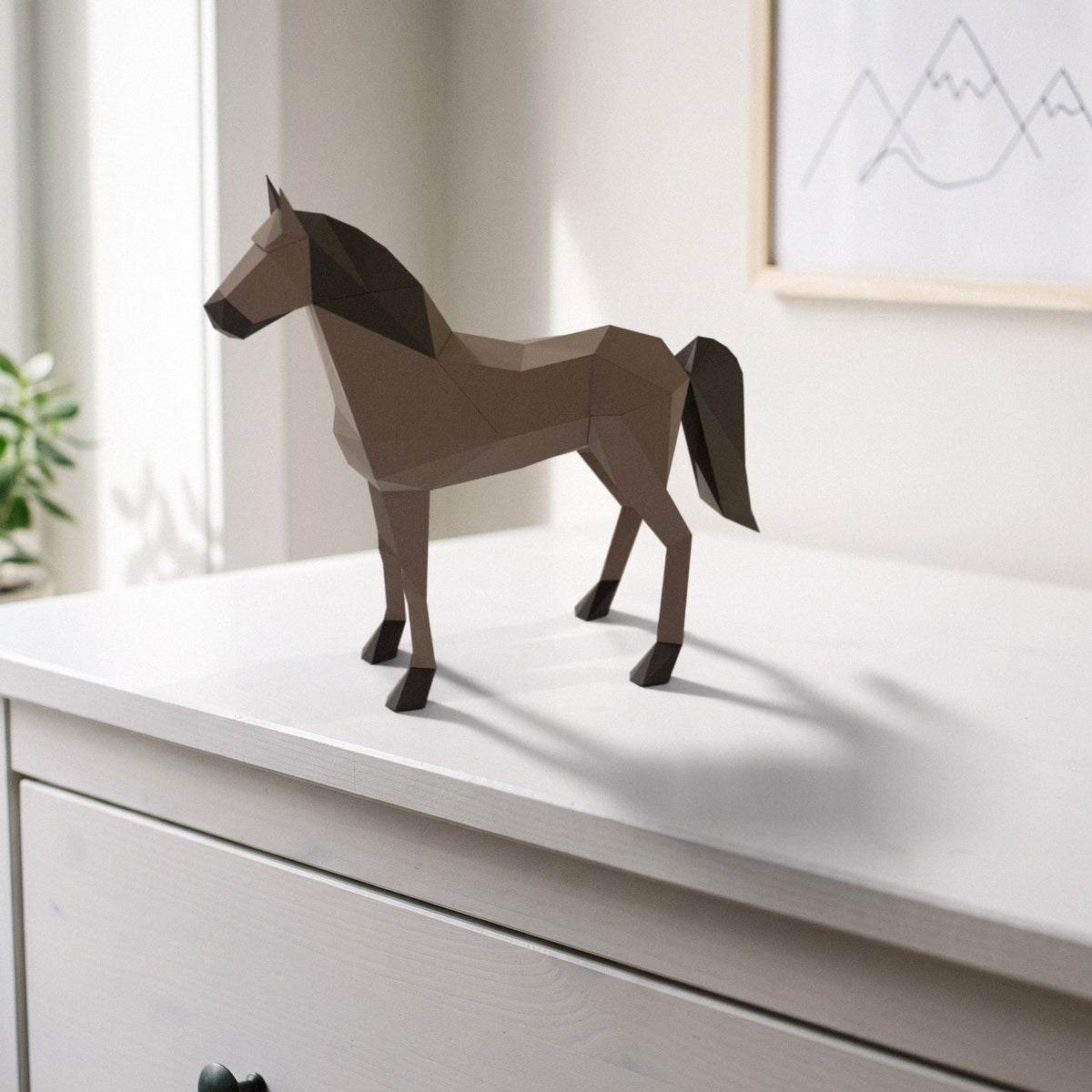Paper Horse model on a dresser in a kids' room