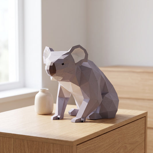 Paper Koala model on a table by the window
