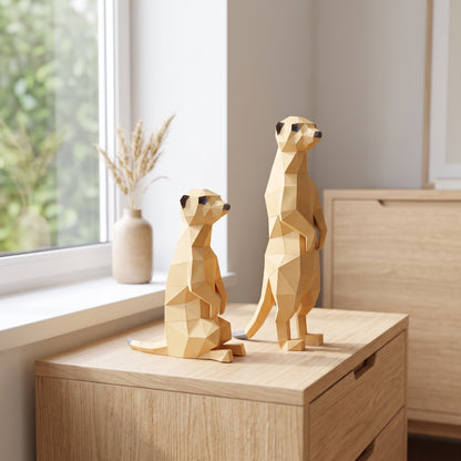 Paper Meerkats model on a table by the window