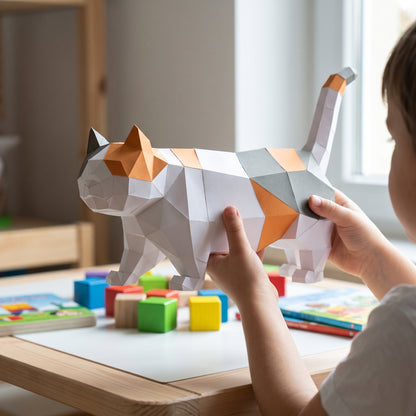 Paper Munchkin (standing) model in a child's hands