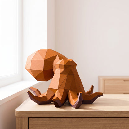 Paper Octopus model on a table by the window
