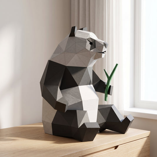 Paper Panda model on a table by the window