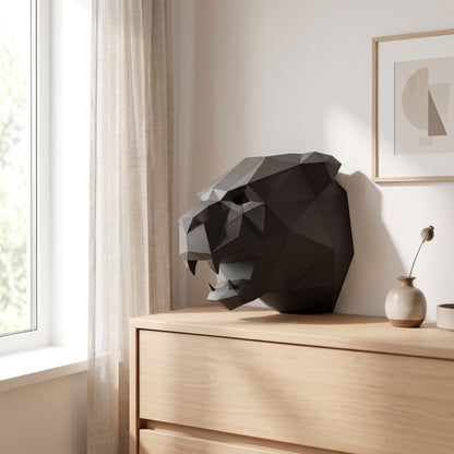 Paper Panther model on a table by the window