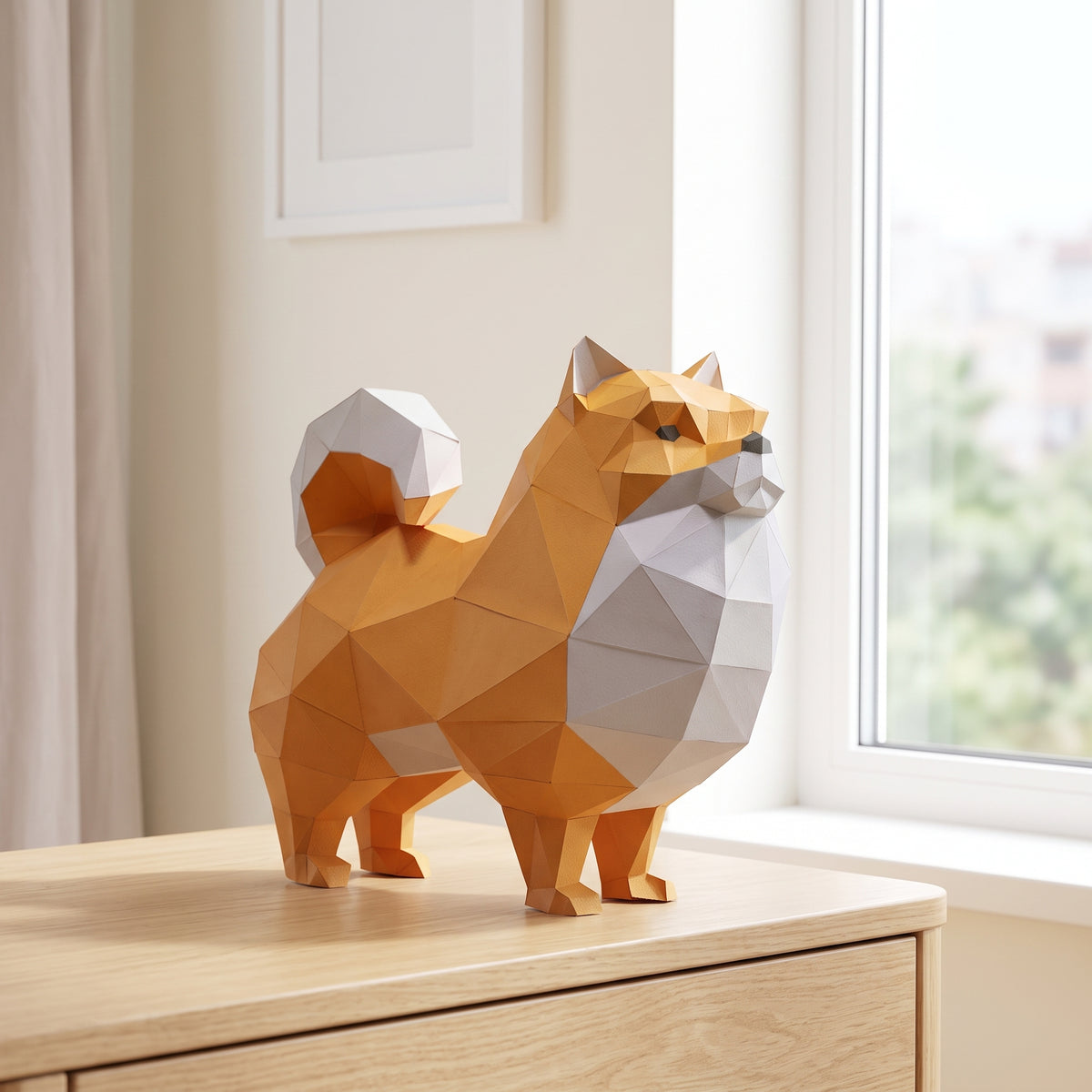 Paper Pomeranian model on a table by the window