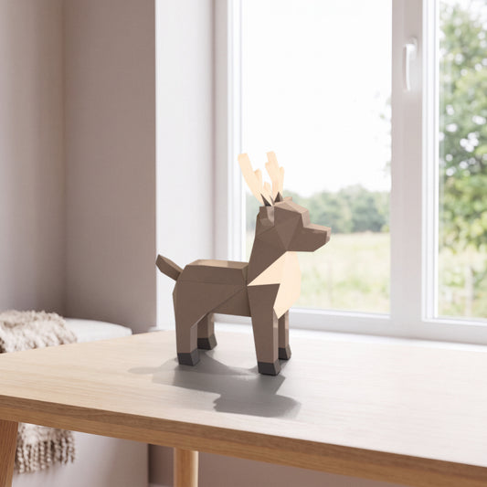 Paper Reindeer model on a table by the window