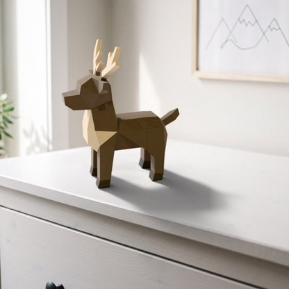 Paper Reindeer model on a dresser in a kids' room