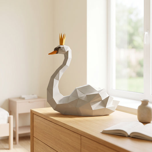 Paper Swan model on a table by the window