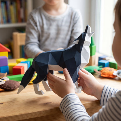 Paper Wolf model in a child's hands